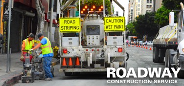 Roadway asphalt striping