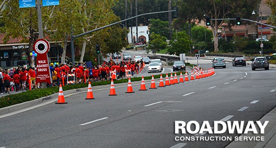 How Can We Fix It words on a road construction barrier Stock