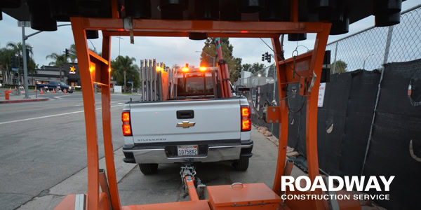 roadway construction traffic control mobile sign